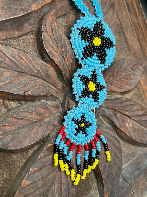 Vintage beaded Three Black Star
